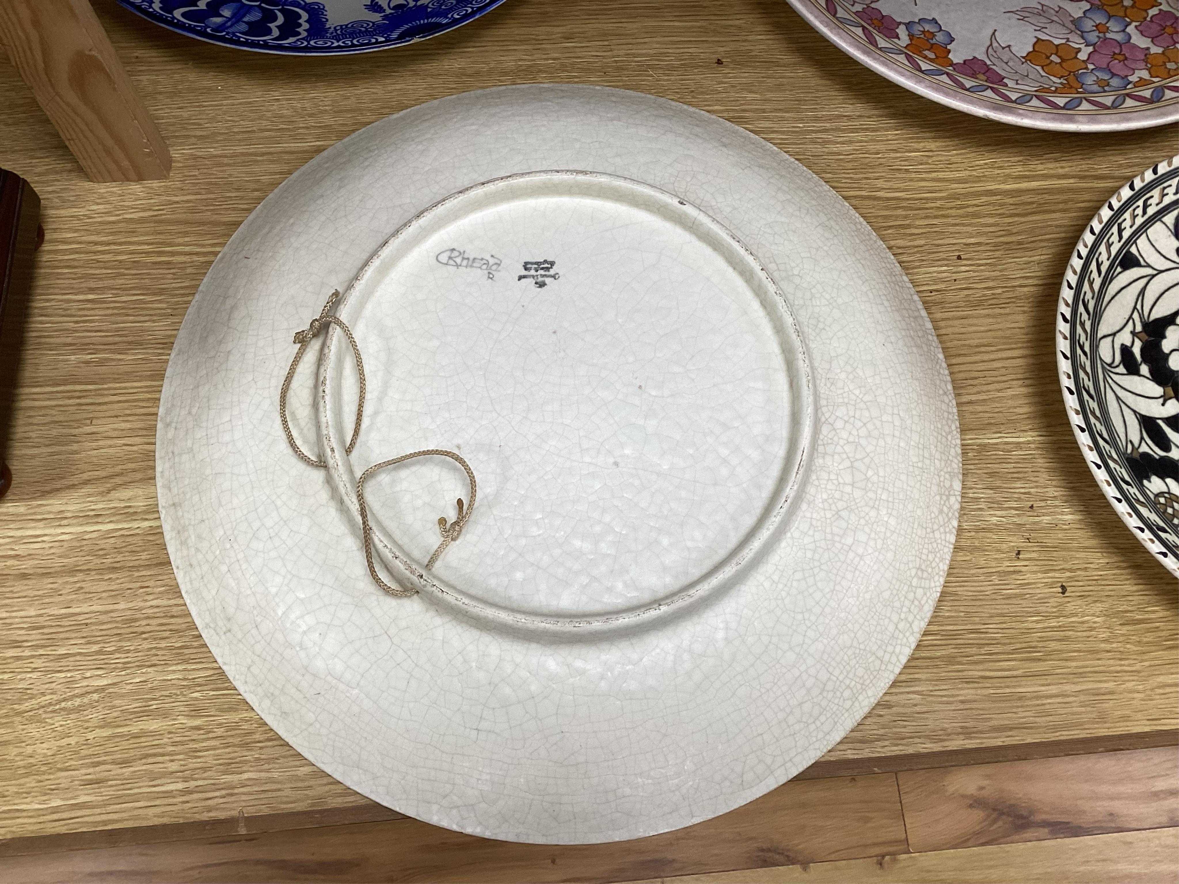 Two Charlotte Rhead signed chargers, a similar signed matching plate and vase and a ‘Mikado’ Burslem blue and white Oriental style charger designed by Frederick Rhead, largest 45cm diameter. Condition - good
